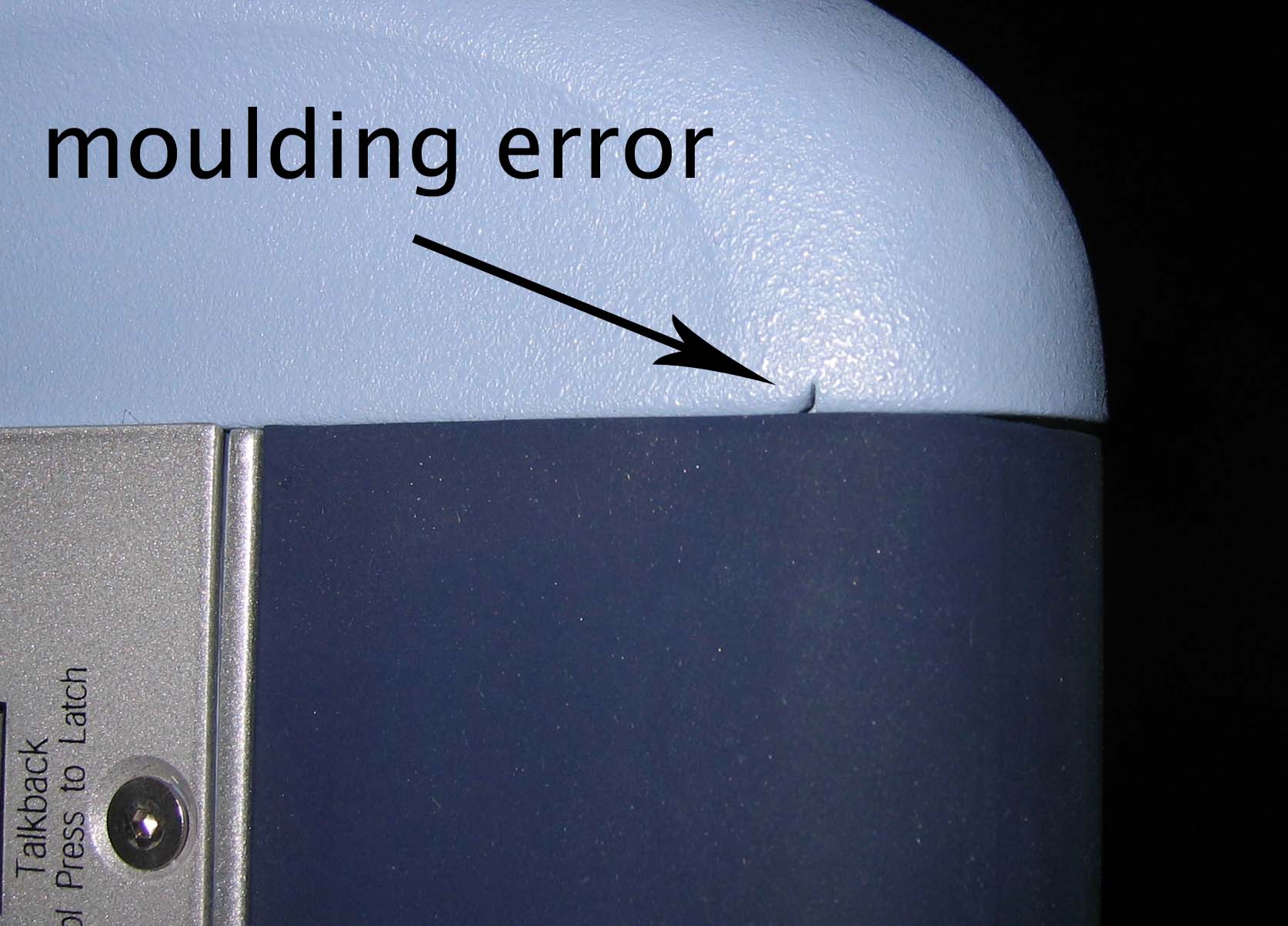 Annotated close-up of the molded edge at the console side interface.